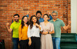 © StockImageFactory - Confident Indian  Asian business team in casuals, smiling, celebrating success in modern workspace