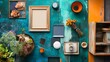 © Juan - Creative flat lay of colorful frames and art materials on teal surface