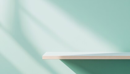 Aufkleber - Empty White Wooden Shelf Against a Pastel Green Wall with Sunlight Shadows