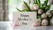 © Emiliia - Celebrate motherhood with a heartfelt greeting card and fresh tulips for Mothers Day