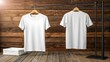 © Yassine - White T-Shirt Hanging on Wooden Fence