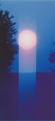 Wall Mural - Soft blue twilight with a glowing sunset.