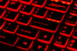 © Tetra Images - Close-up of red and black illuminated laptop keyboard