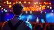 © Fauzerene - Back View of Speaker at Conference with Blurred Lights in Background