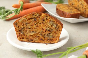 Wall Mural - homemade carrot cake with nuts and vegetables on light grey table, closeup