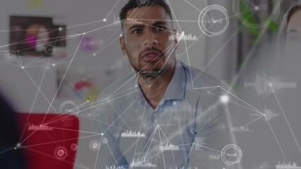 Wall Mural - in office, businessman discussing data analytics with animation of digital network