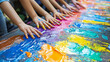 © WahdaniSafri - Children's colorful finger painting art activity outdoors