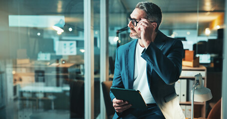 Leinwandbilder - Night, thinking and man on tablet for office report, post deadline or online update research. Mature person, engagement or content strategy for digital marketing trends or social media growth on tech