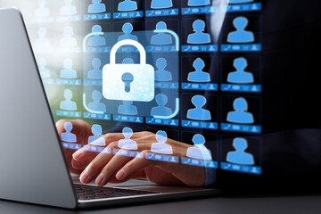 Leinwandbilder - Customer personal information and privacy data protection. Access control and secure encryption system. Businessman in suit typing on laptop computer keyboard at desk in office.