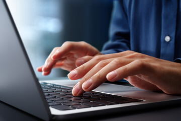 Aufkleber - Closeup of Hands typing on laptop computer keyboard. Businessman working at desk in office. Using technologies in business.