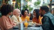 © aun - Diverse Group of Friends Enjoying Meal Together in Bright Café