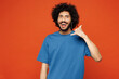 © ViDi Studio - Young happy man of African American ethnicity he wear blue t-shirt casual clothes doing phone gesture like says call me back isolated on plain red orange background studio portrait. Lifestyle concept.