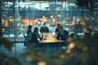 © ttonaorh - Blurred background of a business meeting in a modern office with people sitting at a table, a team working together having a discussion. View through a glass wall