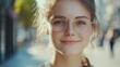 © Ludmila Zabaranilova - Portrait of Caucasian female of 20 years old looking at the camera. Smiling young woman wearing stylish optical eyewear with smart reflection . Women's eye glasses with diopters, vision correction