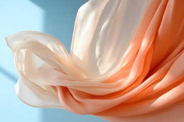 Leinwandbilder - Close Up Of Peach And White Fabric Draped With Shadow And Blue Background