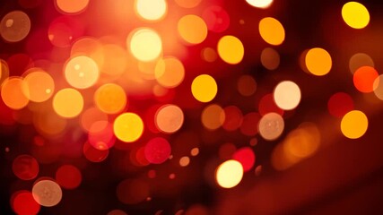 Wall Mural - abstract bokeh lights in warm red orange and yellow colors against dark background