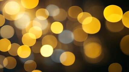 Wall Mural - abstract golden and silver bokeh lights on a dark background creates a festive glow