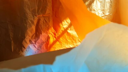 Wall Mural - illuminated crumpled paper: a study in light and texture