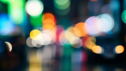 Wall Mural - Multicolor Bokeh Lights Abstract Background Of a Blurry City At Night With Circular Shapes