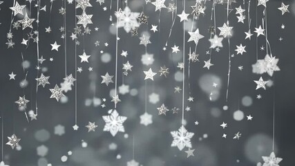 Wall Mural - silver snowflakes falling against gray bokeh background for winter holidays