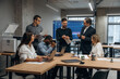 © standret - Professional company. Group of office workers are indoors together