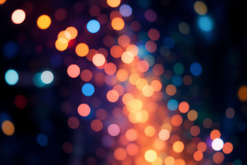 Poster - Abstract image featuring a bokeh effect with blurred lights.  Soft glowing orbs in vibrant orange, blue, and white colors are set against a deep dark background.