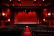 © Hox - A theater with rows of empty seats and red curtains onstage, lit by red spotlights