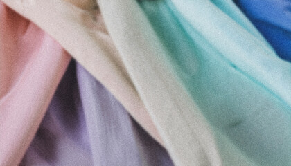 Wall Mural - pastel colored fabric with grainy texture creating an abstract background