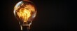 © Itsaree  - Glowing Earth inside lightbulb. Global idea.