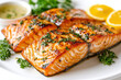 © Duangsaeng - Delicious grilled salmon fillets garnished with fresh herbs and served with lemon slices, creating vibrant and appetizing dish that is perfect for any meal