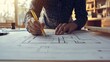© arsya - Architect Designing a House Plan
