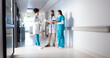 © peopleimages.com - Hospital, meeting and doctors in hallway with notes for consulting, patient results and planning. Healthcare, collaboration and man and women with medical service, diagnosis and help in clinic