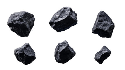 Wall Mural - dark rocks of irregular shape isolated against black background, cut out transparent
