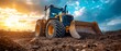 © tongpatong - Soil grading and pushing at an excavation site using a construction tractor equipped with a specialised dozer blade.