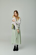 © Bliss - Young woman showcases breezy spring fashion in a stylish, minimalistic setting