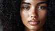 © Vladimir - Close-up portrait of a woman with curly hair.