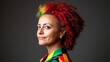 © Radomir Jovanovic - Portrait of a woman with vibrant red curly hair and colorful attire showcasing her confident expression and unique style