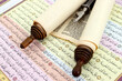 © robertharding - Torah scrolls in Hebrew, Yad and Quran in Arabic, relationship between Muslims and Jews, interfaith peace concept