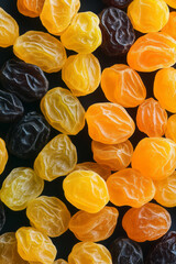 Poster - Macro photography of dried raisins and golden sultanas, highlighting their sweet natural textures,