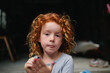 © Austockphoto - Portrait of a young girl with a serious expression