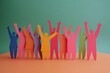 © Imagentive - Colorful Paper Cutout People Celebrating Together