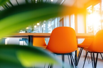 Aufkleber - Vibrant Modern Workspace Design Dynamic Orange Ergonomic Chairs in Sunlit Glass Office - Innovative Corporate Culture and Collaborative Professional Environment