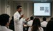 © sitifatimah - South Asian male professor teaches medical concepts to diverse students in modern classroom, promoting collaboration and engagement.