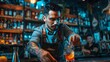 © HISTOCK - Bartender is adding the final touches to a cocktail in a dimly lit bar