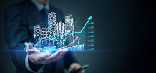 business hand showing futuristic skyline with finance graph, smart city concept, economic growth, in