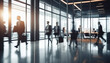 © astaszczyk - Blurred people in motion in modern office.