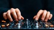 © จิดาภา มีรีวี - Close-up of DJ hands mixing on a professional audio mixer