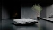 © danadesa - Minimalist stone platform in a dark, modern interior.  A large, light gray stone slab sits atop a dark, polished floor.  Muted tones and natural light create a serene ambiance.