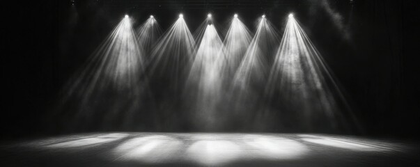 Wall Mural - a dark stage with spotlights shining down creating a dreamy atmosphere.
