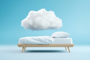 Wall Mural - bed with a white pillow and a cloud in the background